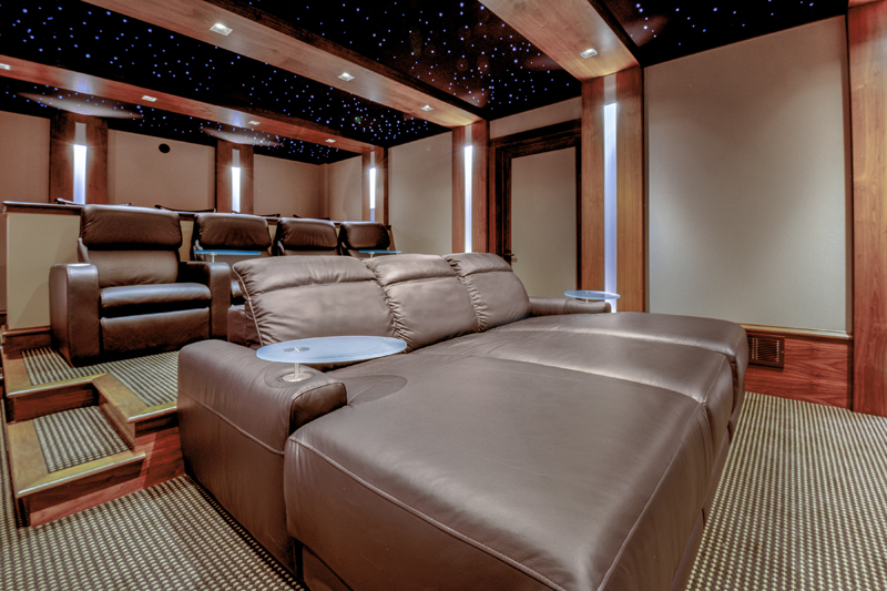 CinemaTech Luxury Home Theater interior design with luxury home theater seating and home theater acoustical treatment