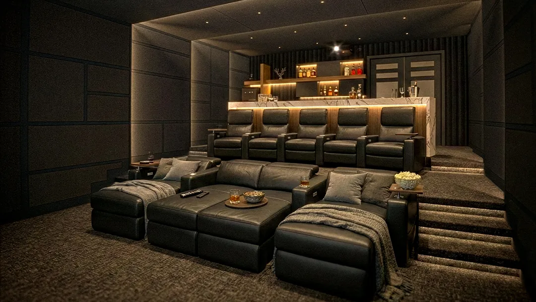 Luxury home theater with front lounge seating, rear recliners, and a raised bar with warm architectural lighting